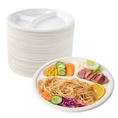 a plate with noodles, meat and vegetables on it next to a stack of plates