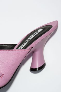 Acne Studios pink mules are crafted from leather, details with lace-up detailing at the front. Complete with a pointed toe and low heel. FN-WN-SHOE000851 Designer Mules With Pointed Toe And Reinforced Heel, Designer Mules With Reinforced Heel And Pointed Toe, Luxury Pink Pointed Toe Mules, Pink Leather Kitten Heels With Sculpted Heel, Chic Pink Leather Kitten Heels, Luxury Pink Mules For Evening, Pink Leather Heels With Wrapped Heel, Pink Leather Kitten Heels For Evening, Designer Summer Kitten Heels With Pointed Toe