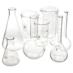 a group of glass beakers and flasks