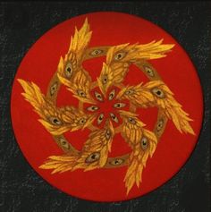 a red plate with gold designs on it