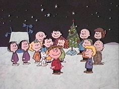 a group of cartoon characters standing in front of a christmas tree