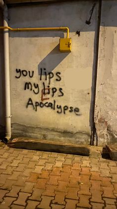 graffiti on the side of a building that says, you tips my hipss approach