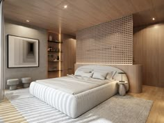 a large white bed sitting inside of a bedroom next to a wooden shelf filled with furniture