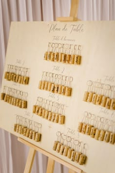 a wooden easel with wine corks on it that says, you're the table