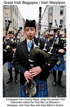 a man in a kilt playing the bagpipes