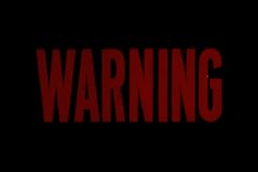 the words warning on a black background