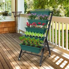 three tiered planter on the porch with flowers