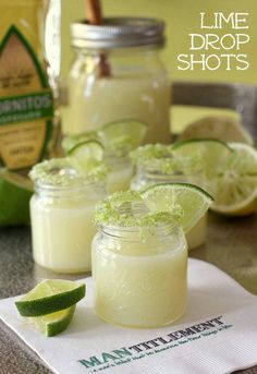 lime drop shots in mason jars on a napkin