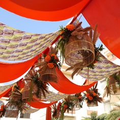 orange and white decorations hanging from the ceiling