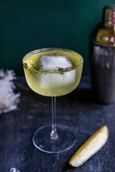 a close up of a drink in a glass on a table