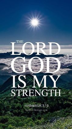 the lord god is my strength bible poster with mountains and clouds in the background on a sunny day