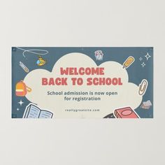 a welcome back to school sign hanging on the wall