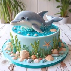 there is a cake with a dolphin on it