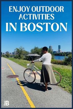 a woman standing next to a bike on the side of a road with text that reads enjoy outdoor activities in boston