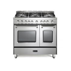 a stainless steel stove with two ovens on each side and four burners in the middle