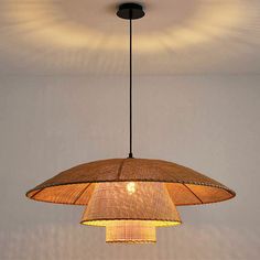 a light fixture hanging from the ceiling in a room