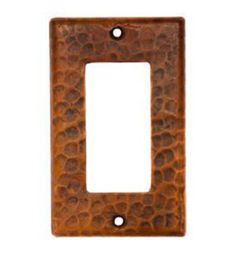 an old light switch plate cover with holes in the middle and one hole at the bottom