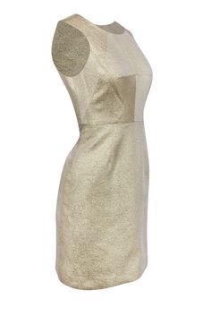 In this dress, you won’t even need to have a star on the top of the tree this year — you’ll be shiny enough! Gorgeous metallic gold covers the exterior of this piece from Shoshanna, creating the perfect holiday look for any party. The sheath silhouette will complement your figure, so pair with stilettos to elongate your legs and you’re ready for soiree season! Size 2 Shell: 40% Polyester, 39% Cotton, 21% Metallic Lining: 100% Poly Stretch Made in USA Concealed back zipper Lined Sheath silhouette Chic Gold Dress For Wedding, Festive Gold Dress For Night Out, Glamorous Gold Holiday Dresses, Gold Glamorous Holiday Dresses, Elegant Gold Holiday Dress, Gold Mini Dress With Fitted Bodice For Evening, Gold Mini Dress For Festive Formal Occasions, Evening Mini Dress With Fitted Bodice In Gold, Festive Gold Mini Dress For Formal Events