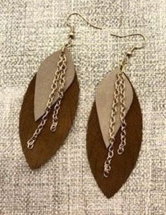 Faux leather embellished with chain detail.  This earring can be custom colored. Leather Feather Earrings, Cork Earrings, Chain Earring, Faux Leather Earrings, Feather Earrings, Chain Earrings, Leather Earrings, Custom Color, Favorite Jewelry