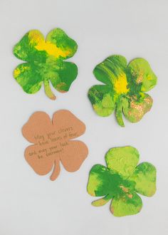 four leaf clovers with the words happy st patrick's day written on them