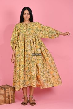 "Printed Cotton Dress, Long Women Dress, Cotton Maxi Dress, Flower Print Dress, Indian Tunic Dress, Block Printed Dress, Boho Dress, Sale Material ~ 100% Cotton gauze. Care ~ Gentle hand wash. Air dry in shade. Made ~ India OUR SIZE GUIDE Please use the following measurements and information as a guide to find the best fit for you so you can flow effortlessly in Indianavogue. MEASUREMENT PREFERENCE Size Chart in Inches:- Size S - Bust-40\" Size M - Bust-42\" Size L - Bust-44\" Size XL - Bust-46\ Yellow Boho Dress With Floral Print For Vacation, Spring Beach Dresses With Printed Motifs, Green Floral Print Boho Dress, Yellow Floral Print Knee-length Dress, Yellow Floral Cotton Maxi Dress, Spring Vacation Dresses With Printed Motifs, Spring Beach Dress With Kalamkari Print, Summer Tunic Dress With Kalamkari Print, Green Printed Dresses For Spring