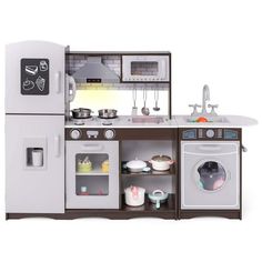 a toy kitchen with an oven, sink and washing machine