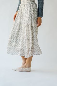 Get ready to twirl in style with the Antosh Tiered Patterned Midi Skirt! This cream-colored skirt features playful tiers and a unique pattern for a fun and quirky look. Perfect for adding personality to any outfit, this skirt will have you feeling confident and stylish. Details self/lining: 100% polyester Fabric Care Guide Here Sizing & Fit Measurements are approximate and taken while laying flat across the front. Not doubled. small: waist = 14"; length = 33" medium: waist = 15"; length = 33" la Casual Tiered Pleated Maxi Skirt, Relaxed Tiered Skirt For Spring, Flowy Tiered Skirt With Gathered Details, Casual Flowy Tiered Skirt, Flowy Tiered Casual Skirt, Flowy Tiered Bottoms For Vacation, Spring Tiered Voluminous Skirt, Spring Tiered Maxi Skirt With Lining, Spring Tiered Maxi Skirt With Gathered Details