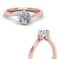 an engagement ring with a pear shaped diamond in the center