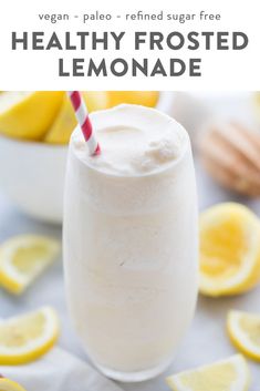 a smoothie in a glass with lemons around it and the text, healthy frosted lemonade