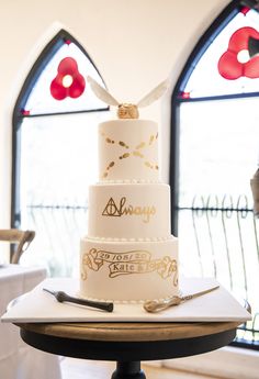 a wedding cake sitting on top of a table