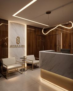 an office lobby with marble counter tops and wooden paneling on the walls, along with two white chairs