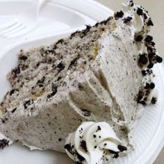 a piece of cake sitting on top of a white plate