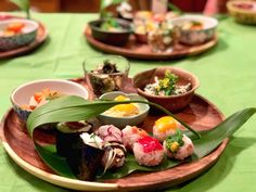 sushi platter with various types of food on it