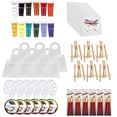 an assortment of crafting supplies including paint, wooden sticks and glues