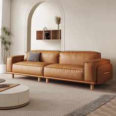 a living room with a couch, coffee table and bookshelf on the wall