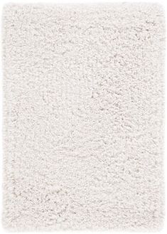 a white area rug that is very soft and shaggyly textured with some light colors