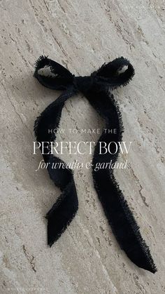 a black bow tied to the side of a stone wall with text overlay that reads how it's make the perfect bow for wrinkles & sentiment