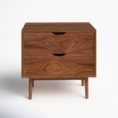 a wooden cabinet with two drawers on one side and an open drawer on the other