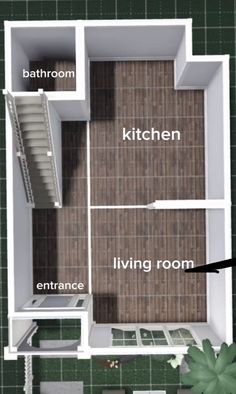 an overhead view of a living room, kitchen and dining area in a small house