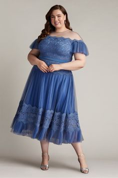 This corded embroidered pleated tulle midi dress showcases an off-shoulder illusion neckline that adds a touch of charm and elegance. Belted at the waist accentuating the figure beautifully while the A-line skirt completes the look with a graceful and romantic flair. Concealed back zip.        Approx. Length from High Point Shoulder to Hem is 54 1/2"  Measurements are taken from size 18Q/2X   Dry Clean  Imported  Our dresses tend to run large. If you are unfamiliar with our sizing, we suggest yo Formal Plus Size, Plus Size Midi Dress, Engagement Party Dresses, Pleated Tulle, Tulle Midi Dress, Swimsuit Cover Up Dress, Midi Dress Plus Size, Illusion Neckline, Tadashi Shoji