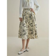 Step into style this winter with our High Waist A-Line Midi Skirt, a perfect blend of comfort and chic. This mid-calf skirt features a subtle ink animal print that adds an artistic touch to a classic silhouette. Crafted from high-quality polyester, it offers a loose fit that gracefully sways with every step, ensuring you look stylish without sacrificing comfort. Key Features Material: Lightweight, breathable polyester fabric. Style: Casual A-line silhouette that flatters every figure. Length: Elegant mid-calf design ideal for various occasions. Elasticity: Medium stretch waistband for a comfortable, custom fit. Pattern: Unique ink animal print for a subtle, yet eye-catching look. Benefits Enhances your wardrobe with a versatile piece suitable for both office and casual outings. Easy to pai Mid Calf Skirt, Winter Work, A Line Cut, Classic Silhouette, Stuffed Animal Patterns, Cozy Sweaters, Family Dinner, Winter Wardrobe, Unique Print