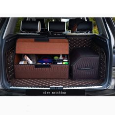 an open trunk in the back of a car with various items and accessories inside it