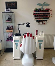 a room filled with lots of different types of hair dryers