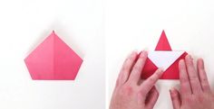 someone is folding an origami piece in half and placing it on the wall