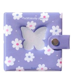 a purple and white flowered case with a butterfly on it's back side