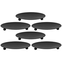 four black round tables with wheels on each side