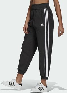 Adidas Adicolor Classics Double-Waistband Fashion Track Pants Style#: GN2868 Black / White Size: Small (XS=0-2, S=4-6, M=8-10, L=12-14, XL=16-18). CLASSIC TRACK PANTS WITH A MODERN LOOK. From sport to hip hop to high fashion, the track suit has come a long way. No wonder it's become a wardrobe staple. These adidas pants build on that story with fresh details, like the high-rise waist and shiny waistband. The recycled nylon plain weave feels smooth against your skin. This product is made with Pri Adidas Adicolor, Adidas Originals Women, Track Suit, Active Wear Pants, Adidas Pants, Tracksuit Bottoms, Airport Outfit, Black Adidas, Adidas Women