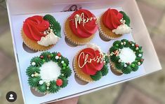 cupcakes decorated with christmas decorations in a box