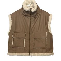 * ** All Items Stored In A Smoke-Free & Pet Free Home * ** See Photos For Measurements, Shown As Inches Elevate Your Winter Wardrobe With This Stylish Boohoo Vest, Perfect For Travel, Workwear, Or Casual Outings. The Faux Leather Outer Shell In A Beautiful Beige Color Is Accented With A Zipper Closure And Lined With Soft Polyester Sherpa For Added Warmth. The Oversized Fit And Breathable Fabric Make It A Comfortable Choice For Any Occasion. This Vest Features Multiple Pockets, And Is Easy To Care For With Machine Washable Garment Care. The Teddy Trim Gilet Model Adds A Touch Of Designer Flair To Your Outfit, While The Various Themes Such As Art, Motorcycle, And Preppy Make It A Versatile C Vest Womens, Sherpa Lined, Winter Wardrobe, Coats Jackets Women, Beige Color, Womens Vest, Vest Jacket, Breathable Fabric, Coats For Women