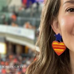 These Houston Astros Beaded Heart Earrings are the perfect accessory for the ballpark, watching the World Series champs at home or a bar, or to support your team everyday! These are sure to be a homerun for any Astros loving fan. Go 'Stros! 100% handmade and so lightweight, you'll forget you are wearing them! Houston Astros, Heart Beads, Heart Earrings, Houston